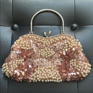 Hand beaded rose gold and pearl clutch